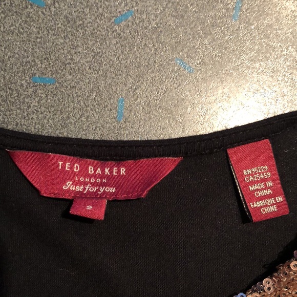 Ted Baker Top- Capped Sleeve. Size 2 Back is see thru material. - Picture 5 of 5